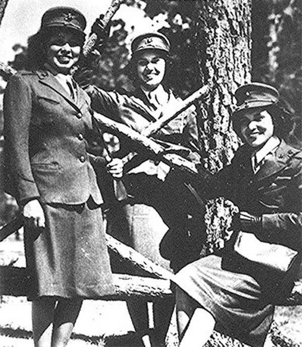 Three Marine Corps reservists at Camp Lejeune, N.C. (from left): Minnie Spotted Wolf (Blackfoot), Celia Mix (Potawatomi), and Viola Eastman (Chippewa), October 16, 1943 (the U.S. Marine Corps, American Indian Select List.