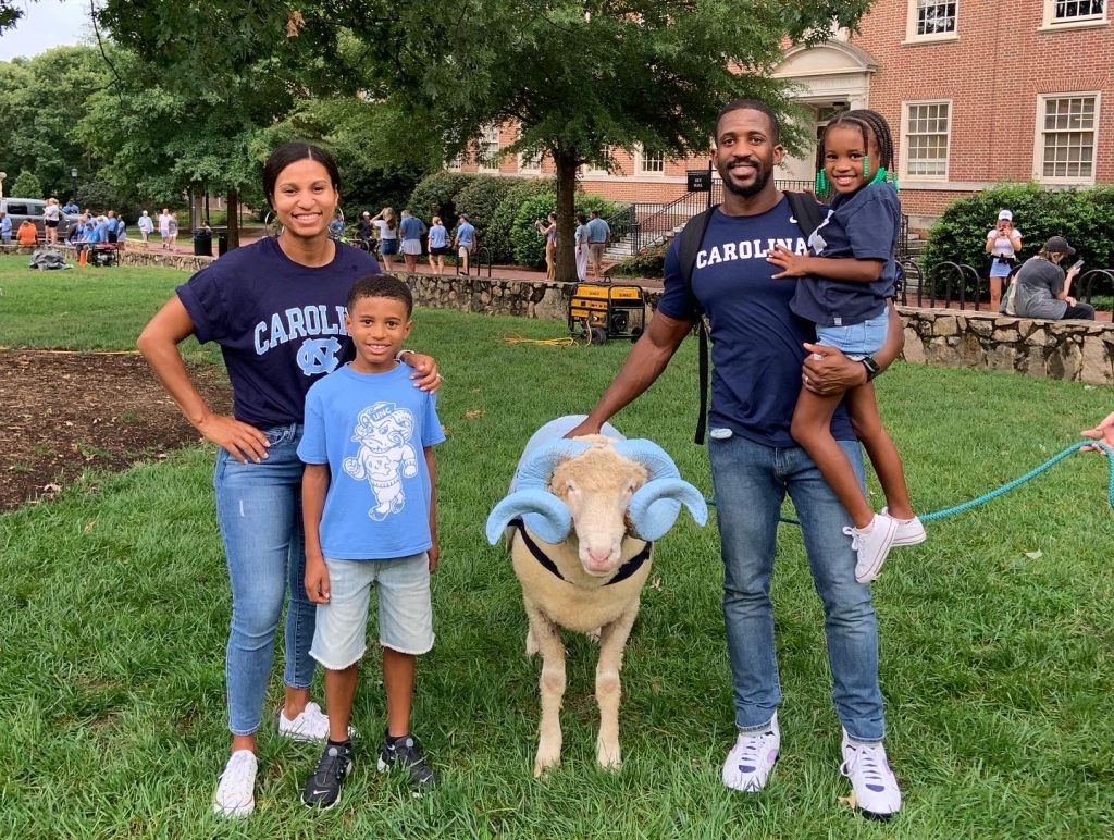 Capt. Kenneth Rodle Harris, III, and his family pose with UNC mascot Rameses on the campus of UNC-Chapel Hill.