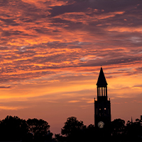Bell tower at sunset on UNC campus