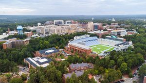 An aerial view of Chapel Hill, N.C., with Kenan Stadium in the foreground.